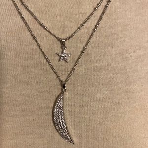 Rhinestone moon and star pendant. Silver tone. Adjustable length